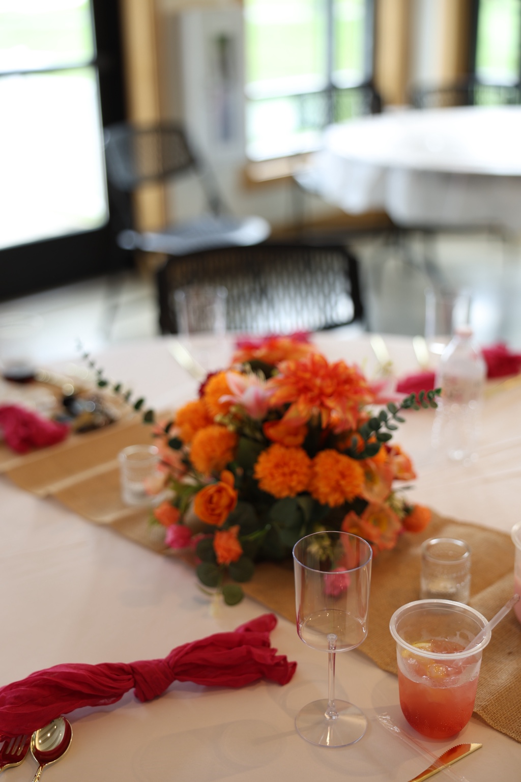 Colorful floral centerpiece on a guest table