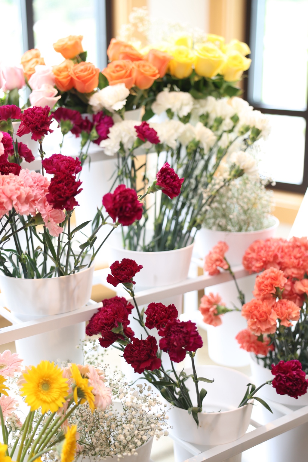 Fresh colorful flowers arranged at a bouquet bar